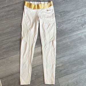 Nike Cream and Gold Athletic Leggings